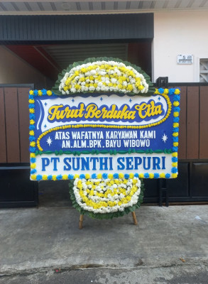Papan Bunga Duka di Besuk