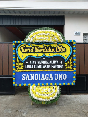 Papan Bunga Duka di Besuk